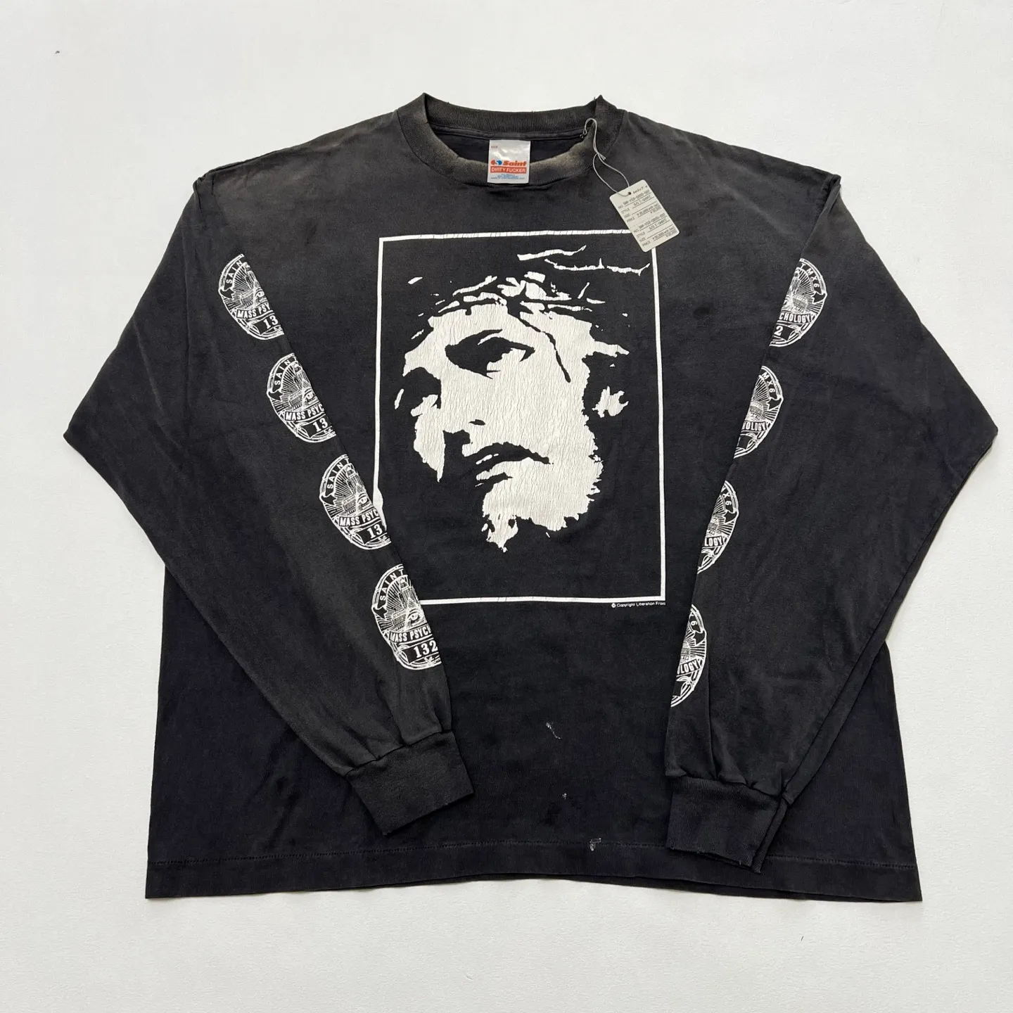 Details SAINT Mxxxxxx LOVE SAINT LS TEE/BLK LOVE SAINT Big Jesus washed and distressed long sleeves Washed black S-XL Cylindrical fabric ready-to-wear Assute dyeing Heavy washing and water fading Hand-splashed ink holes Simulating natural fading and old effects Correct version Correct main mark/washed mark/angel anti-counterfeiting label OEM by the top domestic printing factory Top purchasing level
